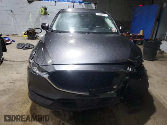 2017 Mazda CX-5 Touring with VIN JM3KFBCL9H0202976, listed as a Copart auction lot 88595355 with 68,066 mi miles and Salvage Title. Bid and sale history available at carsss.com. Image 5.