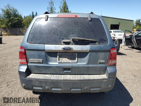 2012 Ford Escape Limited with VIN 1FMCU9EG3CKA51976, listed as a Copart auction lot 65721855 with 142,796 mi miles and Salvage title. Bid and sale history available at DreamBid. Image 6.