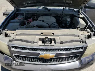 2007 Chevrolet Suburban LS z VIN 1GNFC160X7J180517, wystawiony jako Copart lot #63933475 z przebiegiem Nie podano mil oraz Czysty tytuł • Clean title. Historia ofert i sprzedaży dostępna na DreamBid. Obrazek 12.