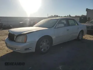 2003 Cadillac DeVille DTS z VIN 1G6KF57963U257494, wystawiony jako Copart lot #84532944 z przebiegiem 104 766 mil mil oraz Szkody całkowita. Historia ofert i sprzedaży dostępna na DreamBid. Obrazek 1.