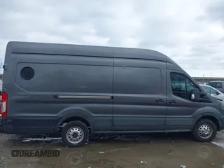 2023 Ford Transit Cargo z VIN 1FTBW3X86PKC01923, wystawiony jako IAAI lot #41886513 z przebiegiem 148 658 mil mil oraz . Historia ofert i sprzedaży dostępna na DreamBid. Obrazek 13.