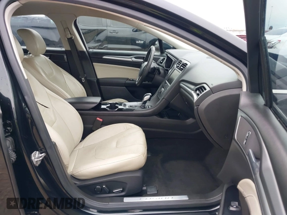 2014 Ford Fusion Titanium with VIN 3FA6P0K9XER364392, listed as a IAAI auction lot 41642439 with 130,302 mi miles and . Bid and sale history available at DreamBid. Image 5.