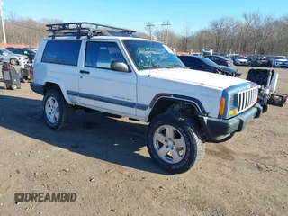 2000 Jeep Cherokee z VIN 1J4FF47S8YL239064, wystawiony jako IAAI lot #41688760 z przebiegiem 171 794 mil mil oraz . Historia ofert i sprzedaży dostępna na DreamBid. Obrazek 1.
