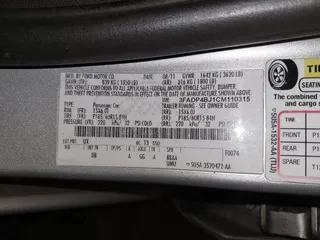 2012 Ford Fiesta SE with VIN 3FADP4BJ1CM110315, listed as a IAAI auction lot 39266357 with 144,749 mi miles. Bid and sale history available at carsss.com. Image 9.