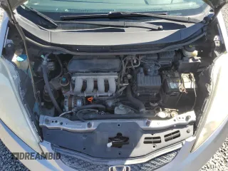 2009 Honda Fit Sport z VIN JHMGE88489S010278, wystawiony jako Copart lot #52251405 z przebiegiem 120 511 mil mil oraz Szkoda całkowita • Salvage title. Historia ofert i sprzedaży dostępna na DreamBid. Obrazek 11.