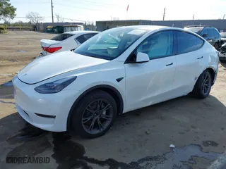 2024 Tesla Model Y Long Range with VIN 7SAYGAEEXRF183885, listed as a IAAI auction lot 41549853 with 7,695 mi miles. Bid and sale history available at carsss.com. Image 20.