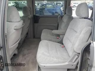 2000 Honda Odyssey EX with VIN 2HKRL1865YH513885, listed as a Copart auction lot 50223505 with 214,627 mi miles and Salvage Title. Bid and sale history available at DreamBid. Image 12.