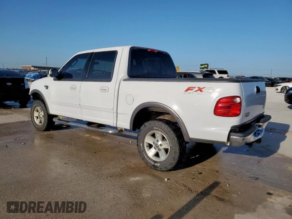 2002 Ford F-150 XLT with VIN 1FTRW08692KD89789, listed as a Copart auction lot 52621555 with 150,012 mi miles and Salvage Title. Bid and sale history available at carsss.com. Image 2.