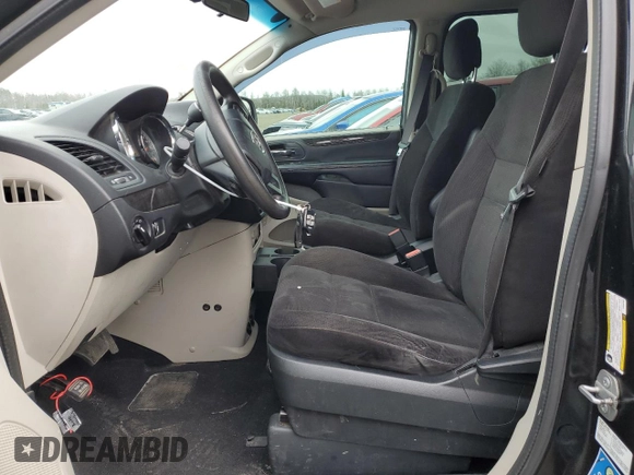2014 Dodge Grand Caravan SE 30th Anniversary with VIN 2C4RDGBG9ER467543, listed as a Copart auction lot 87100594 with 393,038 mi miles and Clean Title. Bid and sale history available at DreamBid. Image 7.