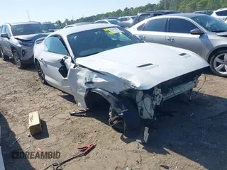 2020 Ford Mustang EcoBoost with VIN 1FA6P8TH1L5136754, listed as a IAAI auction lot 42065192 with 65,063 mi miles and . Bid and sale history available at DreamBid. Image 1.