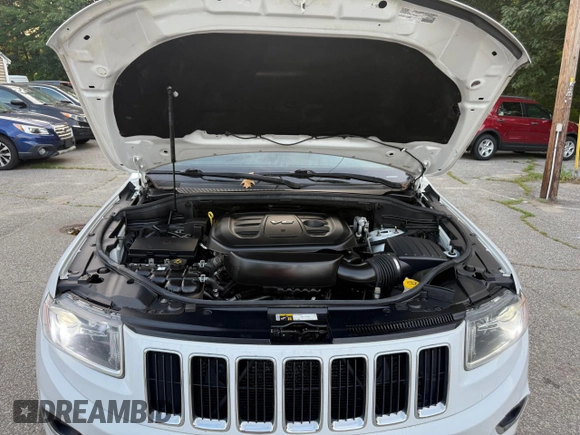 2016 Jeep Grand Cherokee Limited 75th Anniversary z VIN 1C4RJFBG6GC404625, wystawiony jako Copart lot #62492115 z przebiegiem 203 728 mil mil oraz Czysty tytuł • Clean title. Historia ofert i sprzedaży dostępna na DreamBid. Obrazek 7.