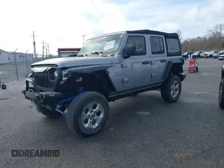 2020 Jeep Wrangler Unlimited Sport S with VIN 1C4HJXDG4LW221778, listed as a IAAI auction lot 41441662 with 76,026 mi miles and . Bid and sale history available at DreamBid. Image 14.