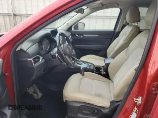 2017 Mazda CX-5 Touring with VIN JM3KFBCL2H0130289, listed as a Copart auction lot 51287885 with 70,170 mi miles and Salvage Title. Bid and sale history available at carsss.com. Image 7.