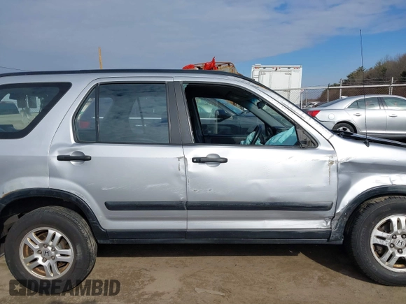 2002 Honda CR-V LX z VIN JHLRD78532C050707, wystawiony jako IAAI lot #41704967 z przebiegiem 306 564 mil mil oraz . Historia ofert i sprzedaży dostępna na DreamBid. Obrazek 14.