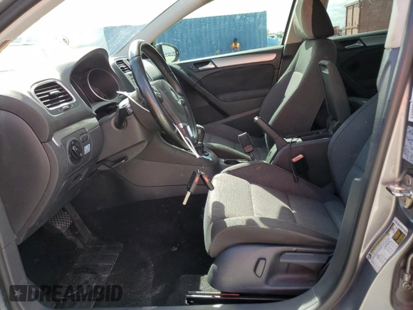 2014 Volkswagen Golf TDI w/Sunroof & Nav z VIN WVWDM7AJ7EW003715, wystawiony jako Copart lot #79524694 z przebiegiem Nie podano mil oraz Szkoda całkowita • Salvage title. Historia ofert i sprzedaży dostępna na DreamBid. Obrazek 7.