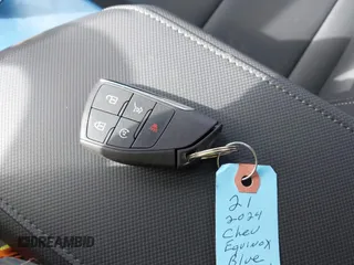 2024 Chevrolet Equinox EV LT z VIN 3GN7DLRP9RS289221, wystawiony jako IAAI lot #41995446 z przebiegiem 4109 mil mil oraz . Historia ofert i sprzedaży dostępna na DreamBid. Obrazek 11.