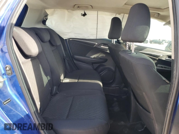 2019 Honda Fit EX z VIN 3HGGK5H82KM739808, wystawiony jako Copart lot #53745645 z przebiegiem 112 697 mil mil oraz Szkoda całkowita • Salvage title. Historia ofert i sprzedaży dostępna na DreamBid. Obrazek 11.
