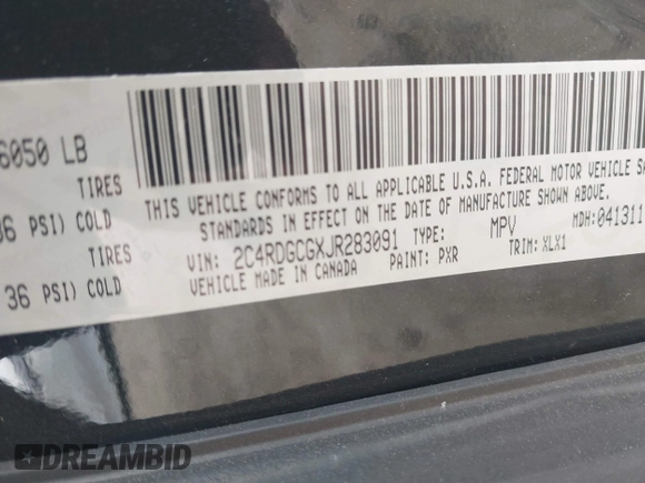 2018 Dodge Grand Caravan SXT with VIN 2C4RDGCGXJR283091, listed as a IAAI auction lot 41966553 with 102,309 mi miles and . Bid and sale history available at DreamBid. Image 9.