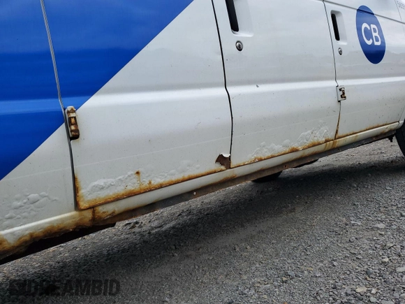 2012 Ford Econoline Cargo Commercial with VIN 1FTNE2EL1CDB21042, listed as a IAAI auction lot 42679263 with 90,458 mi miles and . Bid and sale history available at DreamBid. Image 9.