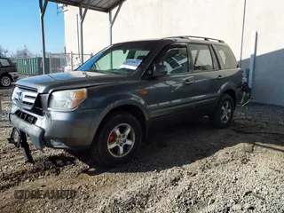 2007 Honda Pilot EX-L with VIN 5FNYF18777B012649, listed as a IAAI auction lot 42070873 with 167,419 mi miles and . Bid and sale history available at DreamBid. Image 2.