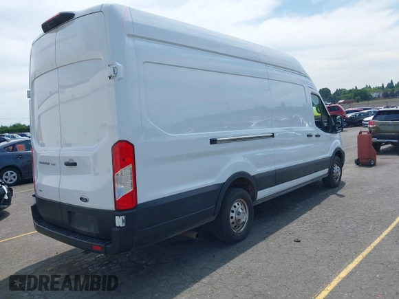 2023 Ford Transit Cargo z VIN 1FTBR3U86PKA69175, wystawiony jako IAAI lot #42520049 z przebiegiem 50 866 mil mil oraz . Historia ofert i sprzedaży dostępna na DreamBid. Obrazek 4.