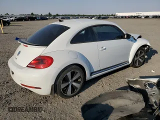 2016 Volkswagen Beetle Turbo R-Line with VIN 3VWVT7AT9GM602303, listed as a Copart auction lot 63845354 with 65,796 mi miles and Salvage Title. Bid and sale history available at DreamBid. Image 3.