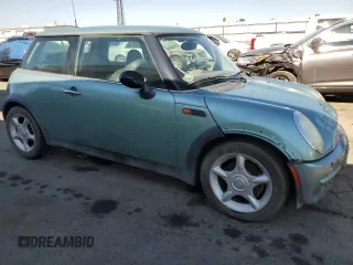 2002 MINI Hardtop with VIN WMWRC33422TE13196, listed as a Copart auction lot 59277643 with 80,501 mi miles and Non Repairable. Bid and sale history available at DreamBid. Image 4.