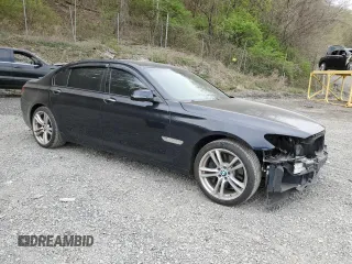 2014 BMW 7 Series ALPINA B7 xDrive with VIN WBAYF8C51ED652985, listed as a Copart auction lot 54299625 with 80,577 mi miles and Salvage Title. Bid and sale history available at DreamBid. Image 4.