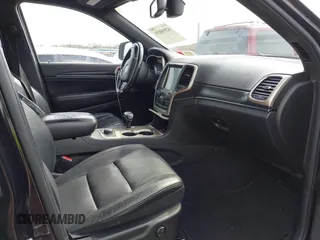 2014 Jeep Grand Cherokee Limited with VIN 1C4RJFBG4EC220054, listed as a IAAI auction lot 42050036 with 100,552 mi miles and . Bid and sale history available at DreamBid. Image 5.