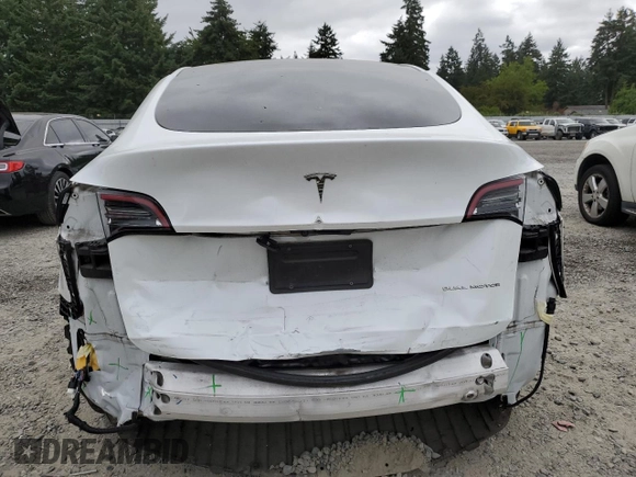 2023 Tesla Model Y Long Range z VIN 7SAYGDEE9PA081604, wystawiony jako Copart lot #60163785 z przebiegiem 42 134 mil mil oraz Szkoda całkowita • Salvage title. Historia ofert i sprzedaży dostępna na DreamBid. Obrazek 6.
