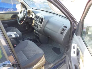 2003 Ford Escape XLT Popular 2 with VIN 1FMYU93103KE17610, listed as a IAAI auction lot 41766806 with 1 mi miles. Bid and sale history available at carsss.com. Image 5.
