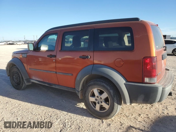 2007 Dodge Nitro SXT with VIN 1D8GU28K87W728744, listed as a Copart auction lot 77082954 with 245,632 mi miles and Salvage title. Bid and sale history available at DreamBid. Image 2.