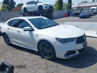 2019 Acura TLX w/A-Spec Pkg with VIN 19UUB1F6XKA002057, listed as a IAAI auction lot 42595352 with 57,654 mi miles and . Bid and sale history available at DreamBid. Image 1.