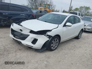 2013 Mazda 3 i Sport with VIN JM1BL1UP7D1750167, listed as a IAAI auction lot 42039994 with 191,641 mi miles and . Bid and sale history available at DreamBid. Image 2.