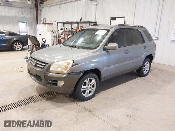 2005 Kia Sportage LX with VIN KNDJE723157089856, listed as a IAAI auction lot 41826630 with 200,380 mi miles and . Bid and sale history available at carsss.com. Image 2.