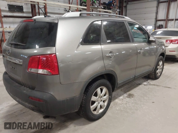 2011 Kia Sorento LX with VIN 5XYKT4A2XBG113975, listed as a IAAI auction lot 41753554 with 225,787 mi miles. Bid and sale history available at carsss.com. Image 4.