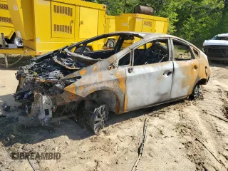 2012 Toyota Prius z VIN JTDKN3DP2C3020630, wystawiony jako Copart lot #52874475 z przebiegiem Nie podano mil oraz Szkoda całkowita • Salvage title. Historia ofert i sprzedaży dostępna na DreamBid. Obrazek 1.