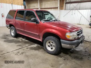1999 Ford Explorer XL z VIN 1FMZU34X3XUB61123, wystawiony jako Copart lot #42259585 z przebiegiem 148 382 mil mil oraz Szkoda całkowita • Salvage title. Historia ofert i sprzedaży dostępna na DreamBid. Obrazek 4.