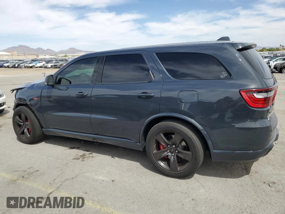 2018 Dodge Durango SRT with VIN 1C4SDJGJ1JC176749, listed as a Copart auction lot 52998575 with 49,234 mi miles and Salvage title. Bid and sale history available at DreamBid. Image 2.