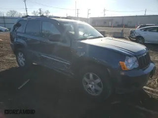 2010 Jeep Grand Cherokee Laredo with VIN 1J4PR4GK2AC125000, listed as a Copart auction lot 45710345 with 121,202 mi miles and Salvage Title. Bid and sale history available at carsss.com. Image 4.