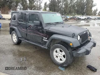 2009 Jeep Wrangler Unlimited X with VIN 1J4GA39119L755818, listed as a Copart auction lot 47886245 with 187,972 mi miles and Salvage Title. Bid and sale history available at carsss.com. Image 4.