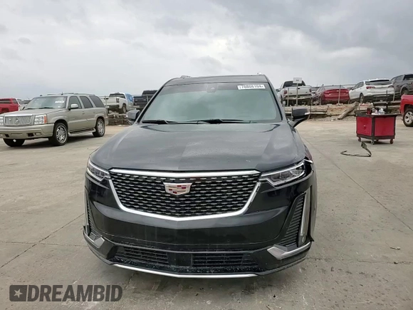 2021 Cadillac XT6 Premium Luxury z VIN 1GYKPERS0MZ181151, wystawiony jako Copart lot #78808104 z przebiegiem 31 697 mil mil oraz Szkoda całkowita • Salvage title. Historia ofert i sprzedaży dostępna na DreamBid. Obrazek 12.