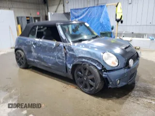 2010 MINI Convertible S z VIN WMWMS3C52ATY50861, wystawiony jako Copart lot #55620135 z przebiegiem 214 734 mil mil oraz Szkoda całkowita • Salvage title. Historia ofert i sprzedaży dostępna na DreamBid. Obrazek 4.