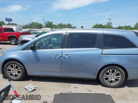 2013 Honda Odyssey EX z VIN 5FNRL5H4XDB062760, wystawiony jako IAAI lot #42063899 z przebiegiem 181 658 mil mil oraz . Historia ofert i sprzedaży dostępna na DreamBid. Obrazek 15.
