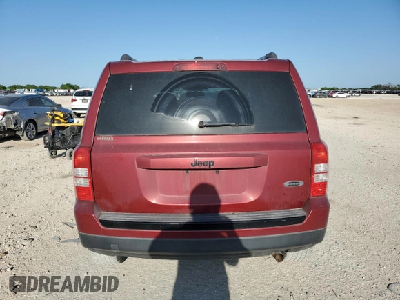 2014 Jeep Patriot Altitude with VIN 1C4NJPBA3ED818713, listed as a Copart auction lot 52256865 with 135,274 mi miles and Salvage title. Bid and sale history available at DreamBid. Image 6.