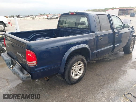 2003 Dodge Dakota Sport with VIN 1D7HL38X13S381160, listed as a IAAI auction lot 42191397 with 97,752 mi miles and . Bid and sale history available at DreamBid. Image 4.