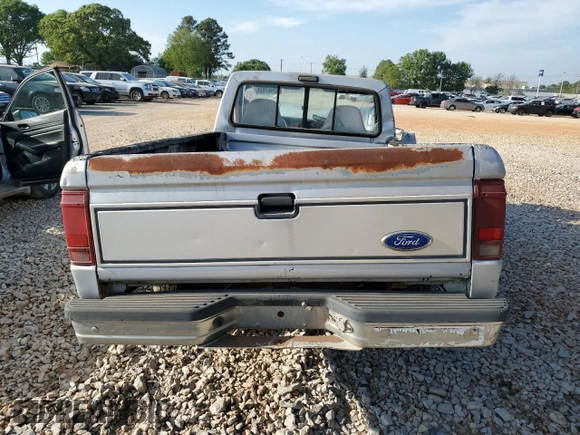1991 Ford Ranger with VIN 1FTCR10U9MUC84433, listed as a Copart auction lot 53667895 with 61,258 mi miles and Salvage title. Bid and sale history available at DreamBid. Image 6.