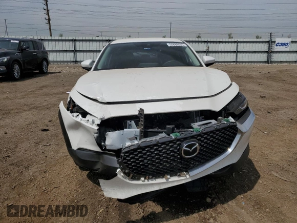 2023 Mazda CX-30 S with VIN 3MVDMBAMXPM586909, listed as a Copart auction lot 55889535 with 21,057 mi miles and Salvage title. Bid and sale history available at DreamBid. Image 5.