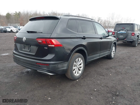 2018 Volkswagen Tiguan S with VIN 3VV1B7AX9JM091210, listed as a IAAI auction lot 41683380 with 63,627 mi miles. Bid and sale history available at carsss.com. Image 4.