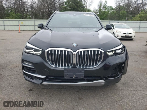 2020 BMW X5 xDrive40i with VIN 5UXCR6C09L9C95232, listed as a Copart auction lot 60697765 with 30,017 mi miles and Salvage title. Bid and sale history available at DreamBid. Image 5.